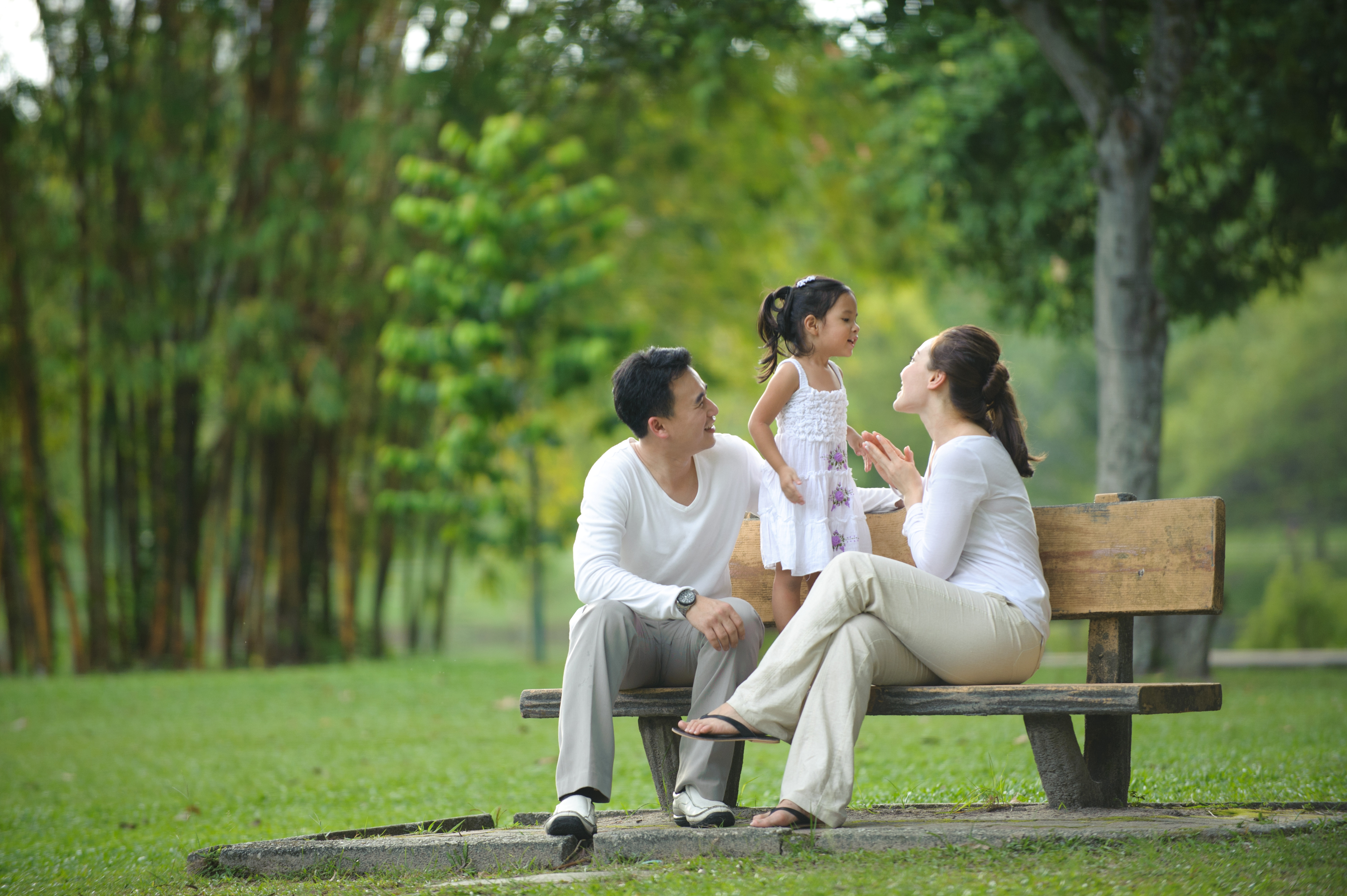 Happy Asian Family enjoying their time in the park