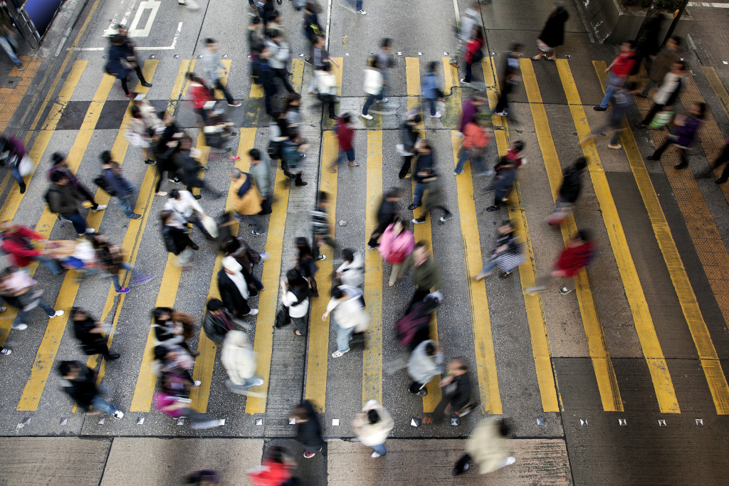 Busy Crossing Street in Hong Kong, China.