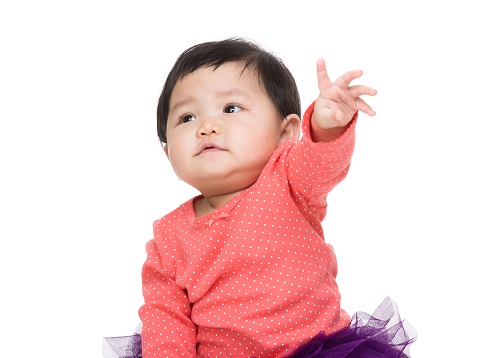 Asian baby girl hand up